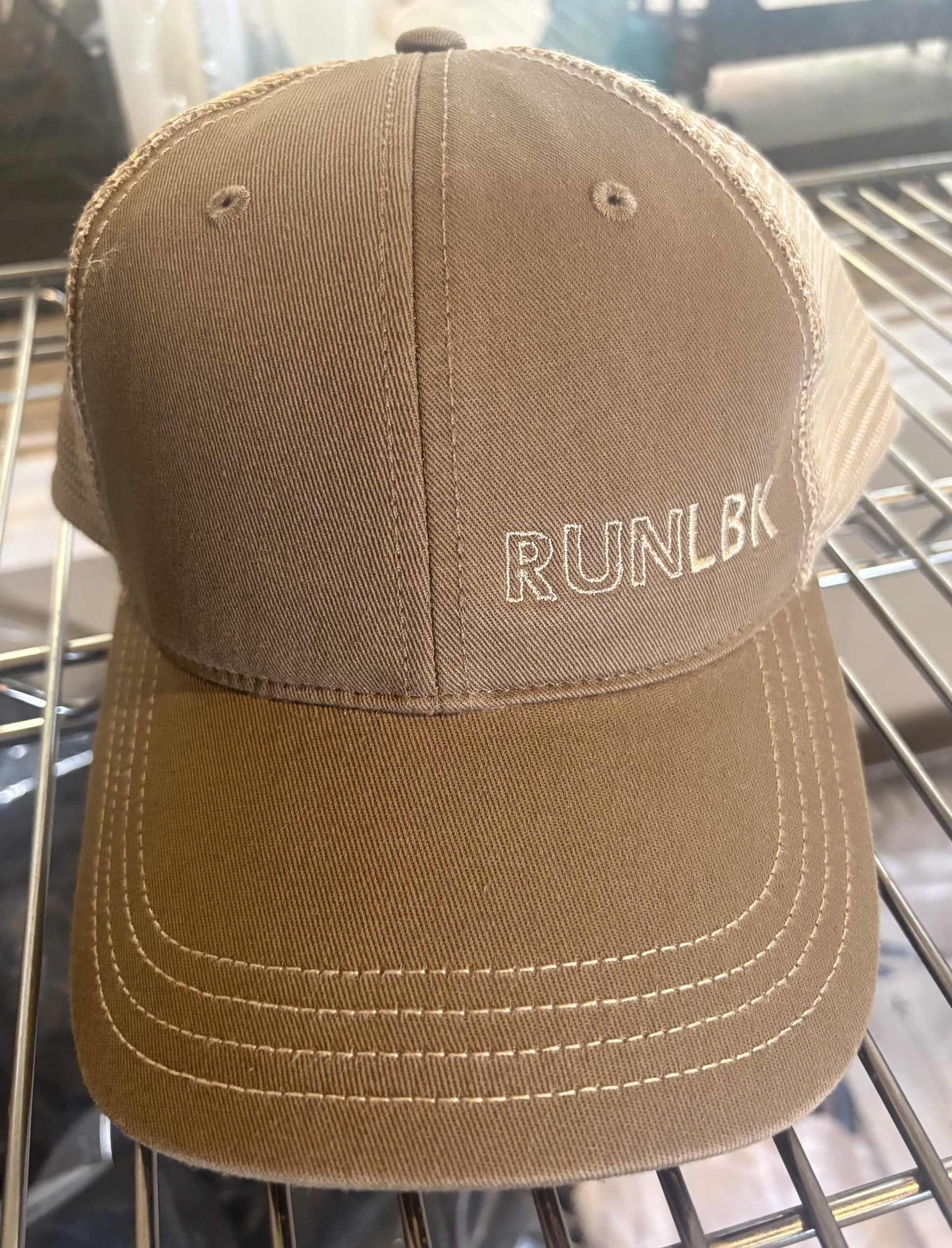 RUNLBK Driftwood/Khaki Embroidery Logo Richardson Garment Washed Trucker Cap